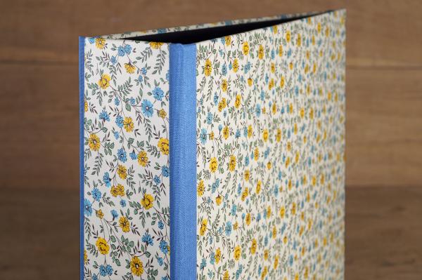 blue and yellow file folder with a twist, handmade in our factory